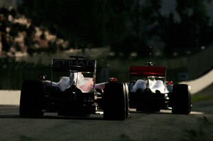 BARCELONA, SPAIN - FEBRUARY 26:  (L-R) Fernando Alonso of Spain and Ferrari and Lewis Hamilton of Great Britain and McLaren Mercedes exit the pitlane during Formula One winter testing at the Circuit De Catalunya on February 26, 2010 in Barcelona, Spain.  (Photo by Ker Robertson/Getty Images)