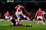 LONDON, ENGLAND - MARCH 09:  Samir Nasri of Arsenal scores his team's third goal during the UEFA Champions League round of 16 match between Arsenal and FC Porto at the Emirates Stadium on March 9, 2010 in London, England.  (Photo by Mike Hewitt/Getty Images)