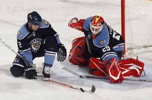 SUNRISE, FL - FEBRUARY 13: Keith Ballard #2 of the Florida Panthers stops a shot before it reaches goaltender Tomas Vokoun #29 of the Florida Panthers during the third period of the game agaisnt the Boston Bruins on February 13, 2010 at the BankAtlantic Center in Sunrise, Florida. The Bruins defeated the Panthers 3-2. (Photo by Joel Auerbach/Getty Images)