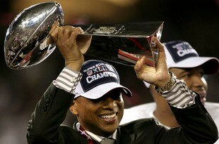 GLENDALE, AZ - FEBRUARY 03:  General Manager Jerry Reese of the New York Giants holds the Vince Lombardi Trophy after defeating the New England Patriots 17-14 in Super Bowl XLII on February 3, 2008 at the University of Phoenix Stadium in Glendale, Arizona.  (Photo by Donald Miralle/Getty Images)