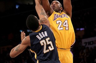 LOS ANGELES, CA - MARCH 02:  Kobe Bryant #24 of the Los Angeles Lakers shoots over Brandon Rush #25 of the Indiana Pacers on March 2, 2010 at Staples Center in Los Angeles, California.  NOTE TO USER: User expressly acknowledges and agrees that, by downloading and/or using this Photograph, user is consenting to the terms and conditions of the Getty Images License Agreement.  (Photo by Stephen Dunn/Getty Images)