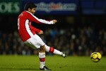 PORTSMOUTH, ENGLAND - DECEMBER 30:  Eduardo of Arsenal scores the opening goal during the Barclays Premier League match between Portsmouth and Arsenal at Fratton Park on December 30, 2009 in Portsmouth, England.  (Photo by Phil Cole/Getty Images)