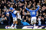 LIVERPOOL, ENGLAND - MARCH 07: Landon Donovan of Everton is lifted in the air by Jack Rodwell after scoring the fourth goal during the Barclays Premier League match between Everton and Hull City at Goodison Park on March 7, 2010 in Liverpool, England.  (Photo by Laurence Griffiths/Getty Images)