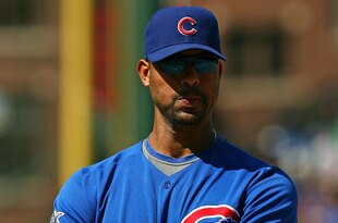CHICAGO - AUGUST 30: Derrek Lee #25 of the Chicago Cubs waits for a pitching change in the 4th inning of a game against the New York Mets on August 30, 2009 at Wrigley Field in Chicago, Illinois. The Mets defeated the Cubs 4-1. (Photo by Jonathan Daniel/Getty Images)