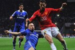 MOSCOW - MAY 21:  Cristiano Ronaldo of Manchester United is tackled by Joe Cole of Chelsea during the UEFA Champions League Final match between Manchester United and Chelsea at the Luzhniki Stadium on May 21, 2008 in Moscow, Russia.  (Photo by Shaun Botterill/Getty Images)