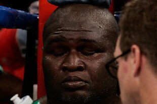 LOS ANGELES, CA - SEPTEMBER 02: James Toney is tended to in his corner during a break in his fight against Samuel Peter during their WBC heavyweight title elimination/NABF & IBA heavyweight championship fight at Staples Center on September 2, 2006 in Los Angeles, California. Peter was named the winner by split decision.  (Photo by Donald Miralle/Getty Images)