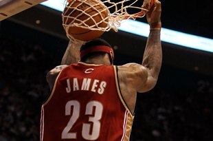 EAST RUTHERFORD, NJ - MARCH 03:  LeBron James #23 of the Cleveland Cavaliers dunks against the New Jersey Nets at the Izod Center on March 3, 2010 in East Rutherford, New Jersey.NOTE TO USER: User expressly acknowledges and agrees that, by downloading and or using this photograph, User is consenting to the terms and conditions of the Getty Images License Agreement.  (Photo by Jim McIsaac/Getty Images)