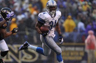 BALTIMORE - DECEMBER 13:  Kevin Smith #34 of the Detroit Lions runs the ball against the Baltimore Ravens at M&T Bank Stadium on December 13, 2009 in Baltimore, Maryland. The Ravens defeated the Lions 48-3. (Photo by Larry French/Getty Images)