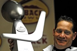 TAMPA, FL - JANUARY 1: Coach Gene Chizik of the Auburn Tigers poses with the Outback trophy after defeating the Northwestern Wildcats in the Outback Bowl January 1, 2010 at Raymond James Stadium in Tampa, Florida.  (Photo by Al Messerschmidt/Getty Images) 
