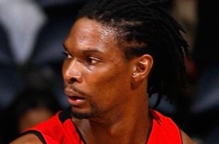 ATLANTA - DECEMBER 02:  Chris Bosh #4 of the Toronto Raptors against the Atlanta Hawks at Philips Arena on December 2, 2009 in Atlanta, Georgia.  NOTE TO USER: User expressly acknowledges and agrees that, by downloading and/or using this Photograph, User is consenting to the terms and conditions of the Getty Images License Agreement.  (Photo by Kevin C. Cox/Getty Images)