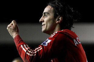 LIVERPOOL, ENGLAND - MARCH 15:  Alberto Aquilani of Liverpool celebrates scoring his team's third goal  during the Barclays Premier League match between Liverpool and Portsmouth at Anfield on March 15, 2010 in Liverpool, England.  (Photo by Alex Livesey/Getty Images)