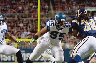 ST. LOUIS, MO - DECEMBER 14:  Darryl Tapp #55 of the Seattle Seahawks moves to tackle Steven Jackson #39 of the St. Louis Rams at the Edward Jones Dome on December 14, 2008 in St. Louis, Missouri. (Photo by: Dilip Vishwanat/Getty Images)