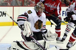 WASHINGTON DC, DC - SEPTEMBER 23:  Corey Crawford #50 of the Chicago Blackhawks defends his net against the Washington Capitals during their preseason game on September 23, 2009 at the Verizon Center in Washington, DC.  (Photo by Jim McIsaac/Getty Images)