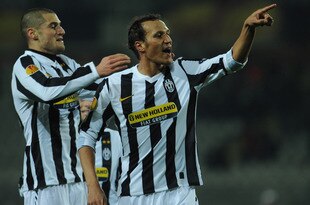 TURIN, ITALY - MARCH 11:  Jonathan Zebina (R) of Juventus FC celebrates his goal during the UEFA Europa League last 16, first leg match between Juventus FC and Fulham FC on March 11, 2010 in Turin, Italy.  (Photo by Valerio Pennicino/Getty Images)