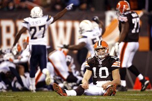 CLEVELAND - DECEMBER 06:  Brady Quinn #10 of the Cleveland Browns reacts after fumbling against the San Diego Chargers at Cleveland Browns Stadium on December 6, 2009 in Cleveland, Ohio.  (Photo by Matt Sullivan/Getty Images)