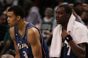 BOSTON - MARCH 07:  JaVale McGee #34 and Andray Blatche #7 of the Washington Wizards wait to go back onto the court after a time out in the final minutes of the game against the Boston Celtics on March 7, 2010 at the TD Garden in Boston, Massachusetts. The Celtics defeated the Wizards 86-83. NOTE TO USER: User expressly acknowledges and agrees that, by downloading and or using this photograph, User is consenting to the terms and conditions of the Getty Images License Agreement.  (Photo by Elsa/Getty Images)