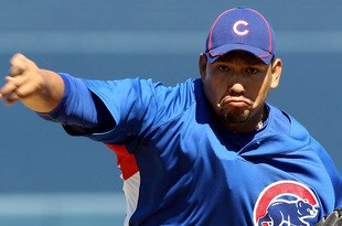 PEORIA, AZ - MARCH 11:  Starting pitcher Carlos Silva #52 of the Chicago Cubs pitchers against the San Diego Padres during the MLB spring training game at Peoria Stadium on March 11, 2010 in Peoria, Arizona.  (Photo by Christian Petersen/Getty Images)