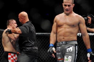 DALLAS - SEPTEMBER 19:  UFC fighter Mirko Cro Cop (L) is stopped by referee after losing to opponent UFC fighter Junior Dos Santo (R) during their Heavyweight bout at UFC 103: Franklin vs. Belfort at the American Airlines Center on September 19, 2009 in Dallas, Texas.  (Photo by Jon Kopaloff/Getty Images)