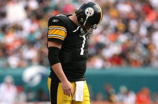 MIAMI - JANUARY 03:  Quarterback Ben Roethlisberger #7 of the Pittsburgh Steelers walks back to the huddle after injuring his shoulder in the fourth quarter against the Miami Dolphins at Land Shark Stadium on January 3, 2010 in Miami, Florida. The Steelers defeated the Dolphins 30-24.  (Photo by Doug Benc/Getty Images)