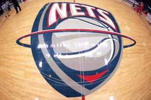 EAST RUTHERFORD, NJ - FEBUARY 24:  A general view of the New Jersey Nets logo on the center court during a game between the New Jersey Nets and the Portland Trail Blazers at the Continental Airlines Arena on Febuary 24, 1999 in East Rutherford, New Jersey.  The Trail Blazers won 94-85.  NOTE TO USER: User expressly acknowledges and agrees that, by downloading and/or using this Photograph, user is consenting to the terms and conditions of the Getty Images License Agreement. (Photo by Al Bello/Getty Images)