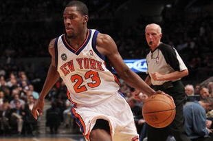 NEW YORK - FEBRUARY 17:  Toney Douglas #23 of the New York Knicks dribbles against the Chicago Bulls at Madison Square Garden on February 17, 2010 in New York, New York. NOTE TO USER: User expressly acknowledges and agrees that, by downloading and or using this photograph, User is consenting to the terms and conditions of the Getty Images License Agreement.  (Photo by Nick Laham/Getty Images)