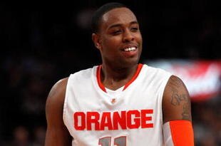 NEW YORK - MARCH 11:  Scoop Jardine #11 of the Syracuse Orange reacts after a call late in the game against the Georgetown Hoyas during the quarterfinal of the 2010 NCAA Big East Tournament at Madison Square Garden on March 11, 2010 in New York City.  (Photo by Michael Heiman/Getty Images)