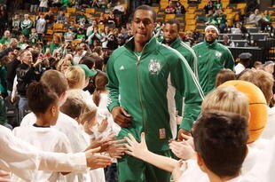 BOSTON - FEBRUARY 27:  Rajon Rondo #9 of the Boston Celtics enters the court before the game against the New Jersey Nets at the TD Garden on February 27, 2010 in Boston, Massachusetts. The Nets defeated the Celtics 104-96.  NOTE TO USER: User expressly acknowledges and agrees that, by downloading and or using this photograph, User is consenting to the terms and conditions of the Getty Images License Agreement.  (Photo by Elsa/Getty Images)