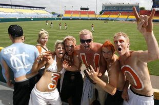 OMAHA, NE - JUNE 23:  A fan of the North Carolina Tar Heels stands near Oregon State Beavers' fans before the start of Game 1 of the NCAA College World Series Championship at Rosenblatt Stadium June 23, 2007 in Omaha, Nebraska.  (Photo by Kevin C. Cox/Getty Images)