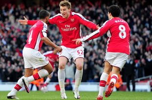 LONDON, ENGLAND - MARCH 06:  Goalscorer Theo Walcott (L) of Arsenal is congratulated by team mates Nicklas Bendtner (C) and Samir Nasri during the Barclays Premier League match between Arsenal and Burnley at Emirates Stadium on March 6, 2010 in London, England.  (Photo by Mike Hewitt/Getty Images)