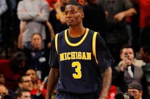 INDIANAPOLIS - MARCH 12:  Guard Manny Harris #3 of the Michigan Wolverines reacts after losing in the final seconds of their quarterfinal game against the Ohio State Buckeyes in the Big Ten Men's Basketball Tournament at Conseco Fieldhouse on March 12, 2010 in Indianapolis, Indiana.  (Photo by Jonathan Daniel/Getty Images)