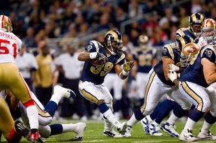 ST. LOUIS - JANUARY 3:  Steven Jackson #39 of the St. Louis Rams carries the ball during the game against the San Francisco 49ers at the Edward Jones Dome on January 3, 2010 in St. Louis, Missouri.  The 49ers beat the Rams 28-6.  (Photo by Dilip Vishwanat/Getty Images)