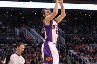 PHOENIX - MARCH 14:  Steve Nash #13 of the Phoenix Suns puts up a three point shot against the New Orleans Hornets during the NBA game at US Airways Center on March 14, 2010 in Phoenix, Arizona. The Suns defeated the Hornets 120-106.  NOTE TO USER: User expressly acknowledges and agrees that, by downloading and or using this photograph, User is consenting to the terms and conditions of the Getty Images License Agreement.  (Photo by Christian Petersen/Getty Images)