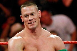 LAS VEGAS - AUGUST 24:  Wrestler John Cena appears in the ring during the WWE Monday Night Raw show at the Thomas & Mack Center August 24, 2009 in Las Vegas, Nevada.  (Photo by Ethan Miller/Getty Images)
