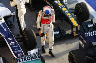 SAKIR, BAHRAIN - MARCH 14:  Jenson Button of Great Britain and McLaren Mercedes is seen in parc ferme following the Bahrain Formula One Grand Prix at the Bahrain International Circuit on March 14, 2010 in Sakir, Bahrain.  (Photo by Mark Thompson/Getty Images)