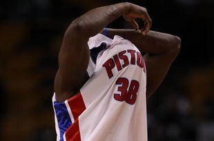 BOSTON - MARCH 15:  Kwame Brown #38 of the Detroit Pistons changes his jersey as instructed by a referee  in the second half against the Boston Celtics on March 15, 2010 at the TD Garden in Boston, Massachusetts. The Celtics defeated the Pistons 119-93.  NOTE TO USER: User expressly acknowledges and agrees that, by downloading and or using this photograph, User is consenting to the terms and conditions of the Getty Images License Agreement.  (Photo by Elsa/Getty Images)