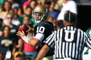 SOUTH BEND, IN - SEPTEMBER 19: Dayne Crist #10 of the Notre Dame Fighting Irish looks for a receiver against the Michigan State Spartans on September 19, 2009 at Notre Dame Stadium in South Bend, Indiana. Notre Dame defeated Michigan State 33-30. (Photo by Jonathan Daniel/Getty Images)