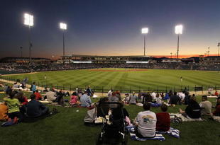 SURPRISE, AZ - MARCH 15:  Fans in the outfield watch the MLB spring training game between the San Francisco Giants and the Texas Rangers at Surprise Stadium on March 15, 2010 in Surprise, Arizona.  (Photo by Christian Petersen/Getty Images)