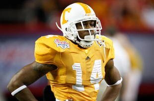 ATLANTA - DECEMBER 31:  Safety Eric Berry #14 of the Tennessee Volunteers takes a breather during the Chick-Fil-A Bowl against the Virginia Tech Hokies at the Georgia Dome on December 31, 2009 in Atlanta, Georgia.  The Hokies beat the Volunteers 37-14.  (Photo by Mike Zarrilli/Getty Images)
