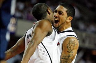 LOUISVILLE, KY - JANUARY 11:  Peyton Siva #3 (right) of the Louisville Cardinals celebrates with Preston Knowles #2 (left) during the Big East Conference game against Villanova at Freedom Hall on January 11, 2010 in Louisville, Kentucky.  (Photo by Andy Lyons/Getty Images)