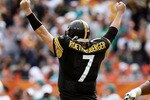 MIAMI - JANUARY 03:  Quarterback Ben Roethlisberger #7 of the Pittsburgh Steelers celebrates after throwing a touchdown pass to wide receiver Mike Wallace #17 in the second quarter against the Miami Dolphins at Land Shark Stadium on January 3, 2010 in Miami, Florida.  (Photo by Doug Benc/Getty Images)