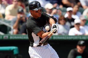 JUPITER, FL - MARCH 15:  Outfielder Mike Stanton #80 of the Florida Marlins hits a two-run home run against the Minnesota Twins at Roger Dean Stadium on March 15, 2010 in Jupiter, Florida. The Marlins defeated the Twins 5-4.  (Photo by Doug Benc/Getty Images)