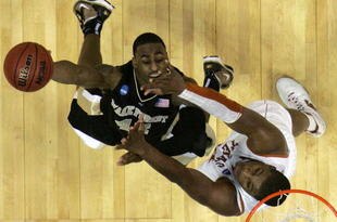 NEW ORLEANS - MARCH 18:  Dexter Pittman #34 of the Texas Longhorns tries to block the shot of the Wake Forest Demon Deacons L.D. Williams #42 during the first round of the 2010 NCAA mens basketball tournament at the New Orleans Arena on March 18, 2010 in New Orleans, Louisiana.  (Photo by Dave Martin/Getty Images)