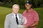DUBLIN, OH - JUNE 07: Jack Nicklaus presents Tiger Woods with the trophy after his one-stroke victory at the Memorial Tournament at the Muirfield Village Golf Club on June 7, 2009 in Dublin, Ohio. (Photo by Scott Halleran/Getty Images)