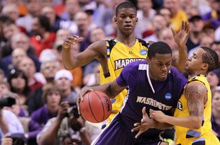 SAN JOSE, CA - MARCH 18:  Forward Matthew Bryan-Amaning #11 of the Washington Huskies drives with the ball against the Marquette Golden Eagles during the first round of the 2010 NCAA men's basketball tournament at HP Pavilion on March 18, 2010 in San Jose, California.  (Photo by Jed Jacobsohn/Getty Images)