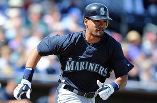 SURPRISE, AZ - MARCH 10:  Franklin Gutierrez #21 of the Seattle Mariners runs to first base during a spring training game against of the Texas Rangers on March 10, 2010 at Surprise Stadium in Surprise, Arizona.  (Photo by Lisa Blumenfeld/Getty Images)