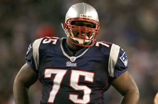 FOXBOROUGH, MA - DECEMBER 23: Vince Wilfork #75 and Tedy Bruschi #54 of the New England Patriots face the Miami Dolphins at Gillette Stadium on December 23, 2007 in Foxborough, Massachusetts. Patriots won 28-7. (Photo by Jim Rogash/Getty Images)