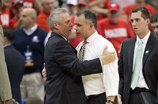 JACKSONVILLE, FL - MARCH 19:  Bo Ryan the Head Coach of the Wisconsin Badgers consoles Mike Young the Head Coach of the Wofford Terriers following 53-49 Wisconsin victory in the first round of the 2010 NCAA men's basketball tournament at Jacksonville Veteran's Memorial Arena on March 19, 2010 in Jacksonville, Florida.  (Photo by Andy Lyons/Getty Images)