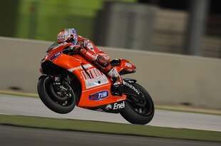 DOHA, QATAR - MARCH 19:  Casey Stoner of Australia and Ducati Marlboro Team  lifts the front wheel during the third day of testing at Losail Circuit on March 19, 2010 in Doha, Qatar.  (Photo by Mirco Lazzari gp/Getty Images)