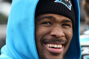 CHARLOTTE, NC - JANUARY 03:  DeAngelo Williams #34 of the Carolina Panthers smiles on the bench during their game against the New Orleans Saints at Bank of America Stadium on January 3, 2010 in Charlotte, North Carolina.  (Photo by Streeter Lecka/Getty Images)