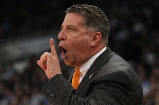 PROVIDENCE, RI - MARCH 20:  Head coach Bruce Pearl of the Tennessee Volunteers instructs his son, Steven Pearl, after he is called for a foul in the first half against the Ohio Bobcats during the second round of the 2010 NCAA men's basketball tournament on March 20, 2010 at the Dunkin Donuts Center in Providence, Rhode Island.  (Photo by Elsa/Getty Images)